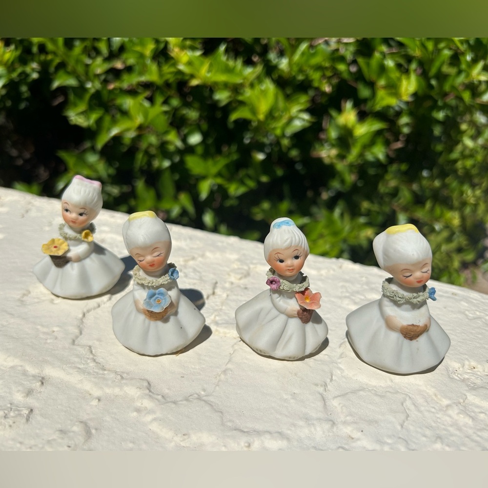 Vintage Set of Four Ceramic Figurines with Flowers